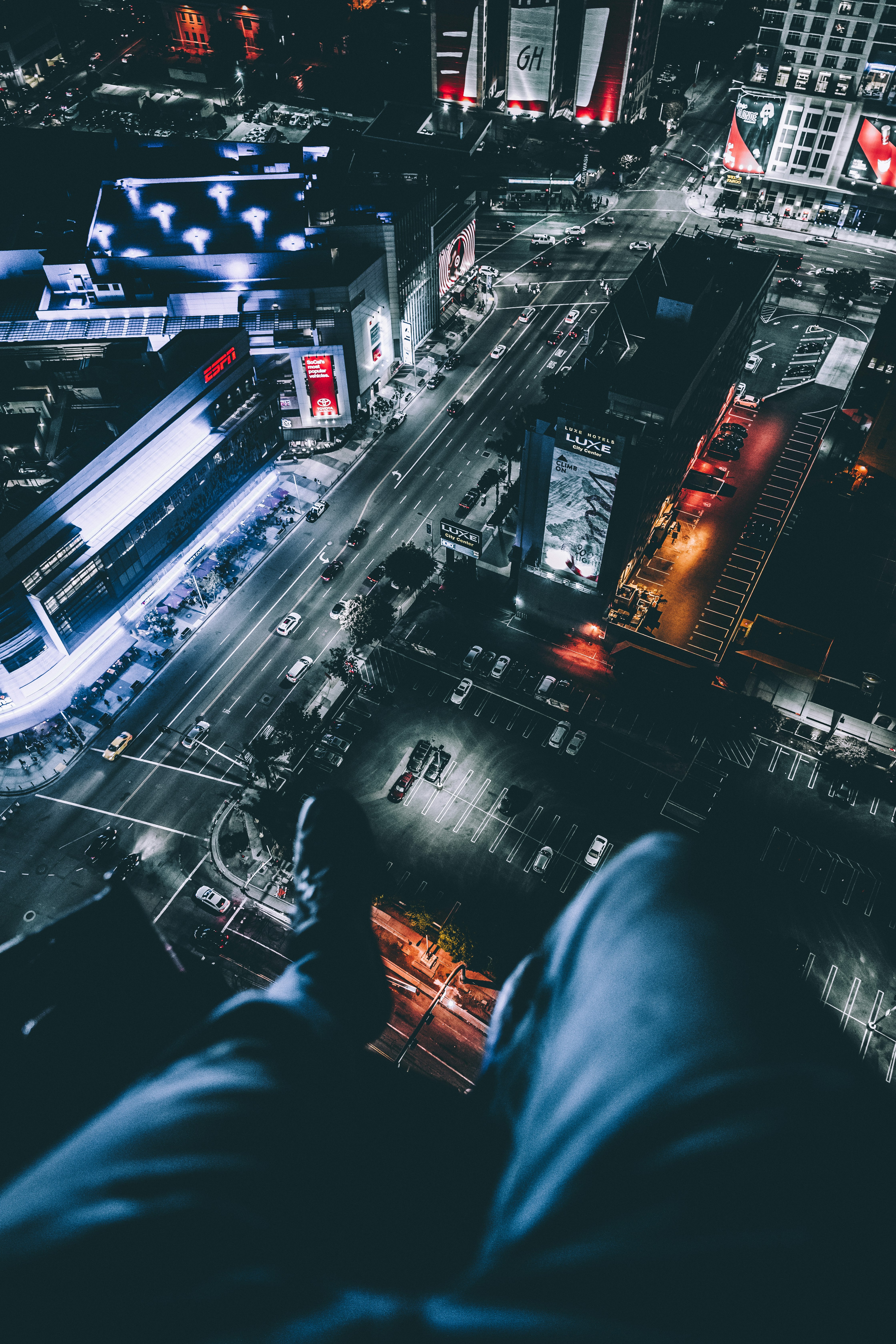 person sitting on top of building